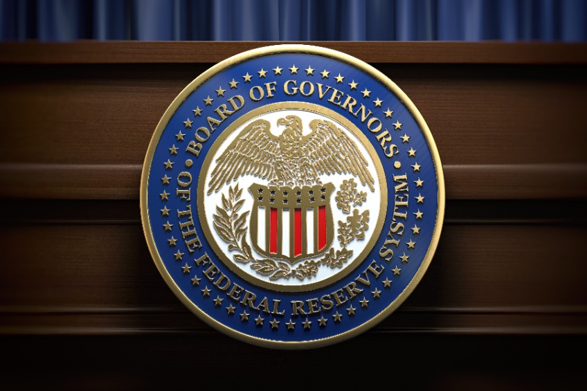Federal Reserve System Fed sign and symbol on tribune in press conference hall