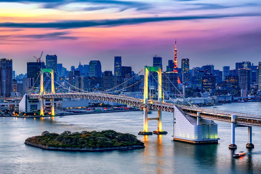 Rainbow bridge Illumination at Sunset with Tokyo Tower Background, Odaiba, Tokyo, Japan