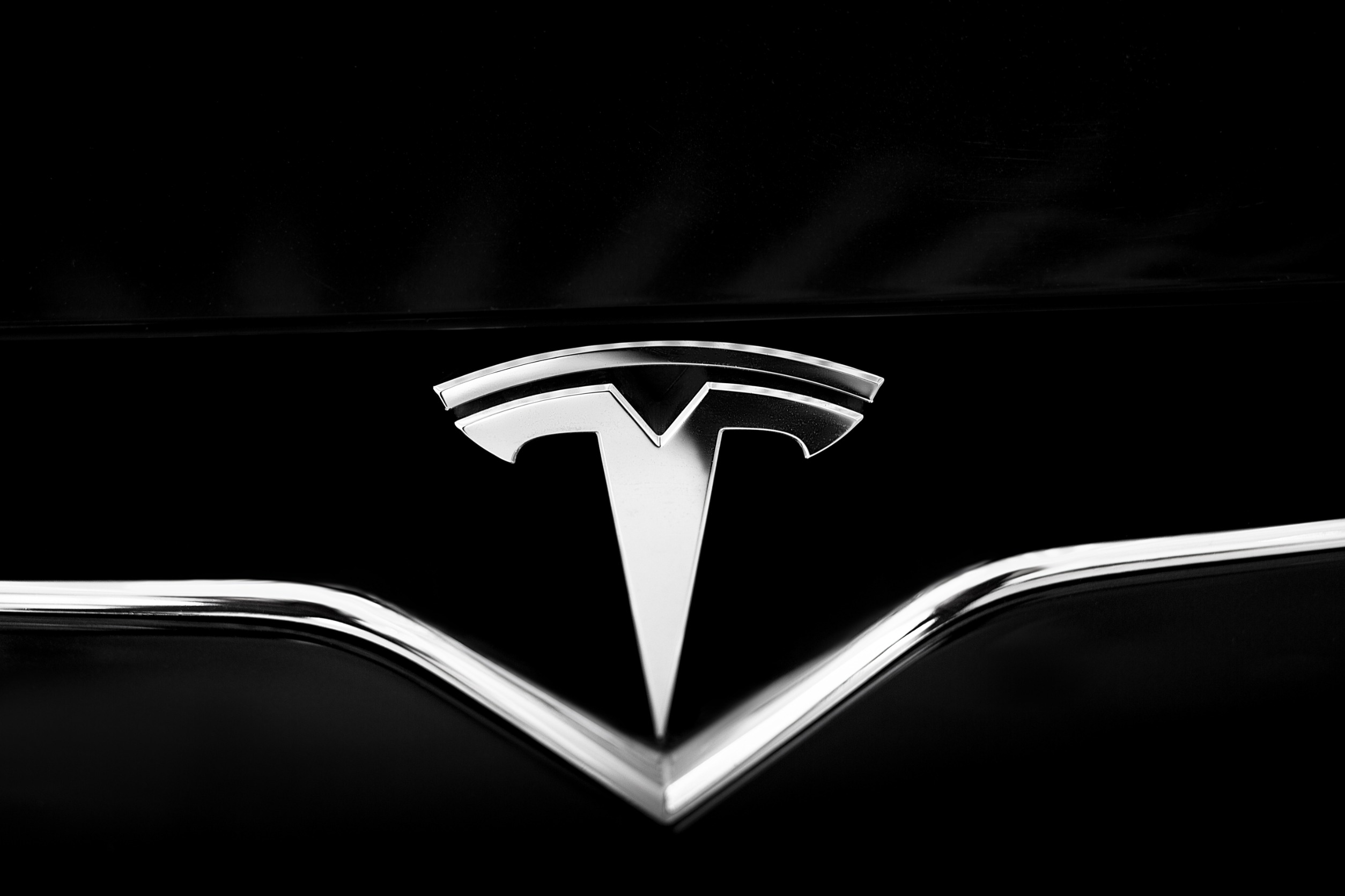 Metal t Letter Symbol of Tesla Car. Emblem Represents Cross-Section of Electric Moto