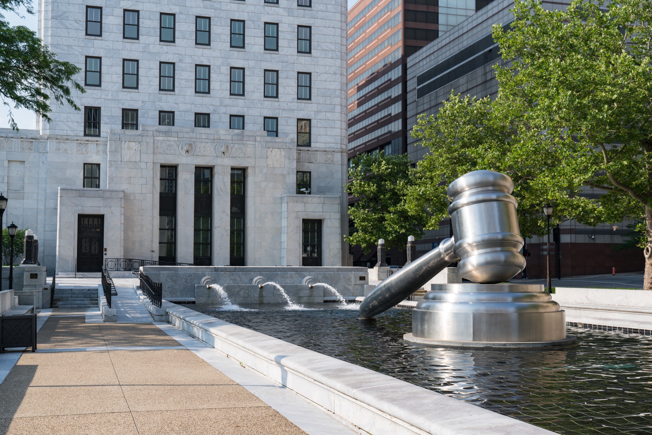 Stainless steel gavel sculpture created by Andrew Scott located in the courtyard of the Ohio Judicial Center in downtown Columbus, Ohio