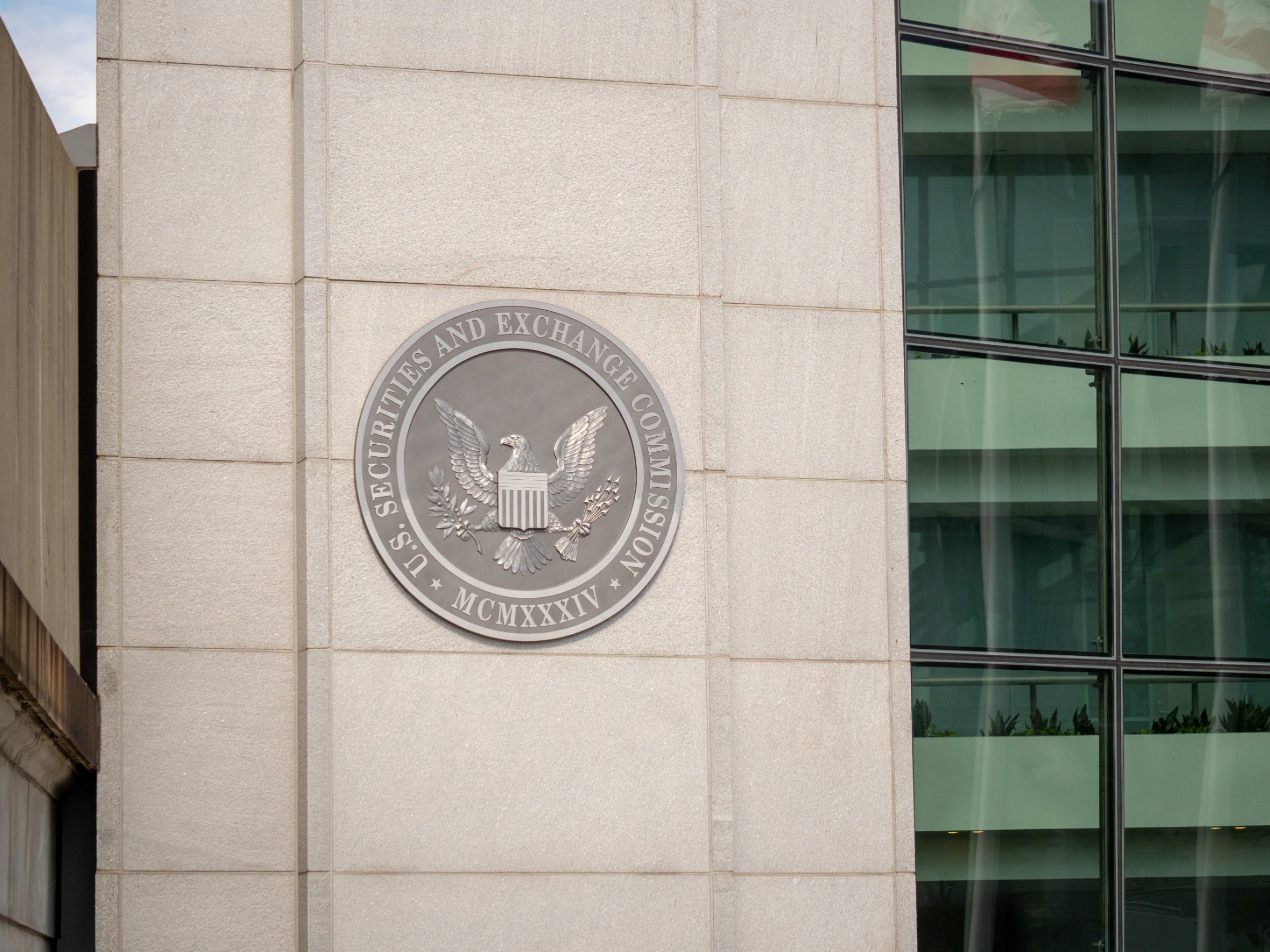 Seal of the SEC on a building.