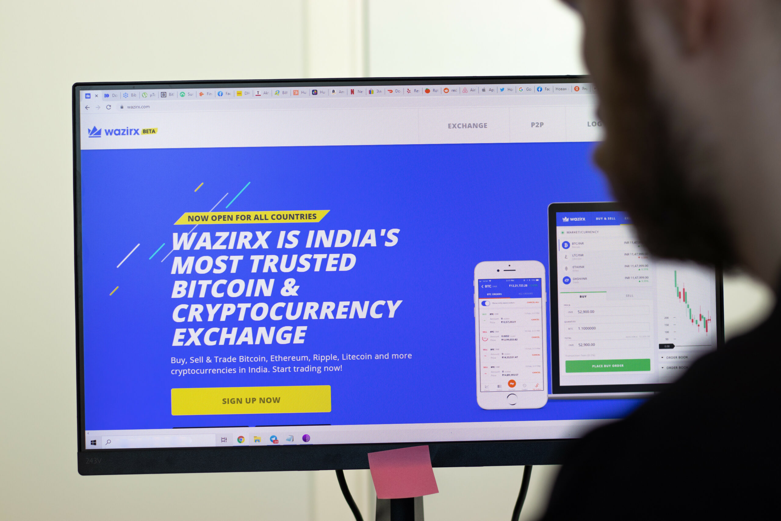 New York, USA - 26 April 2021: wazirx website page on screen, man using service, Illustrative Editorial