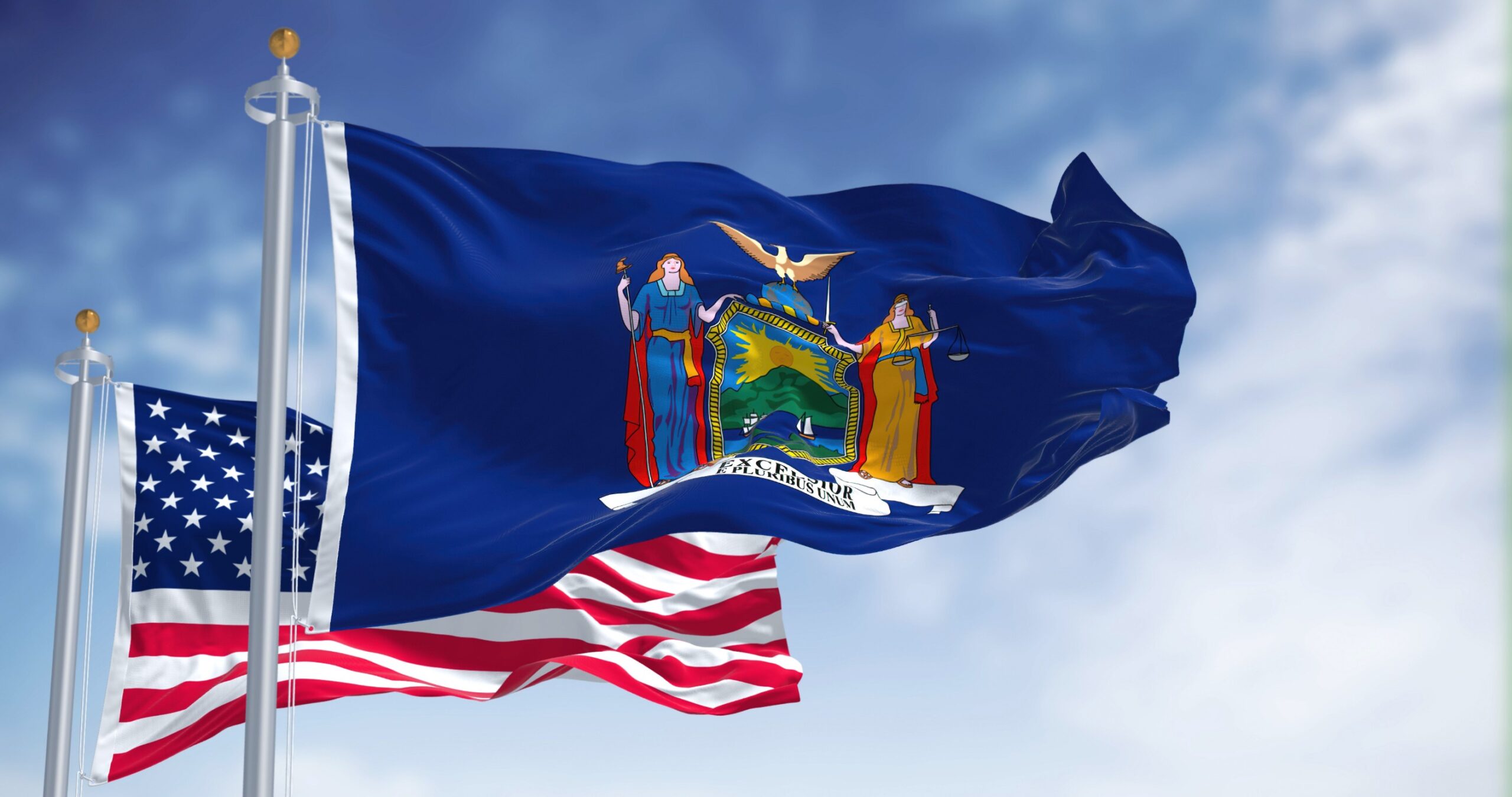 Flags on NY and the US.