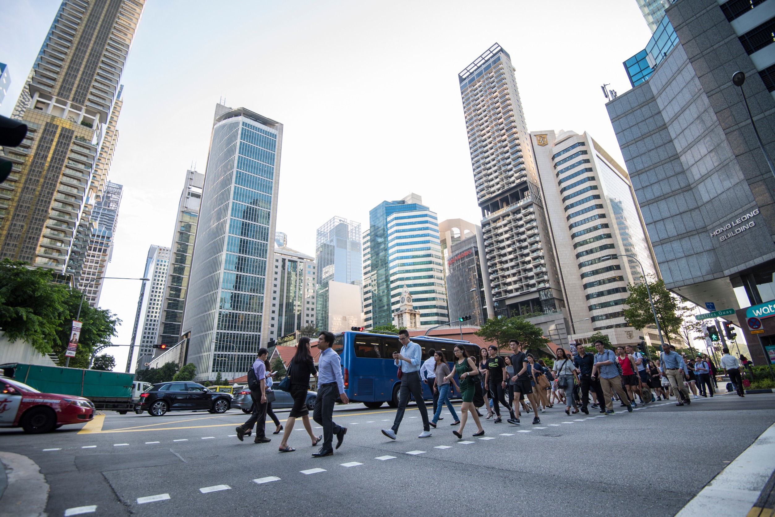 : At the end of the working day office workers walking on the streets of the Central Business District.