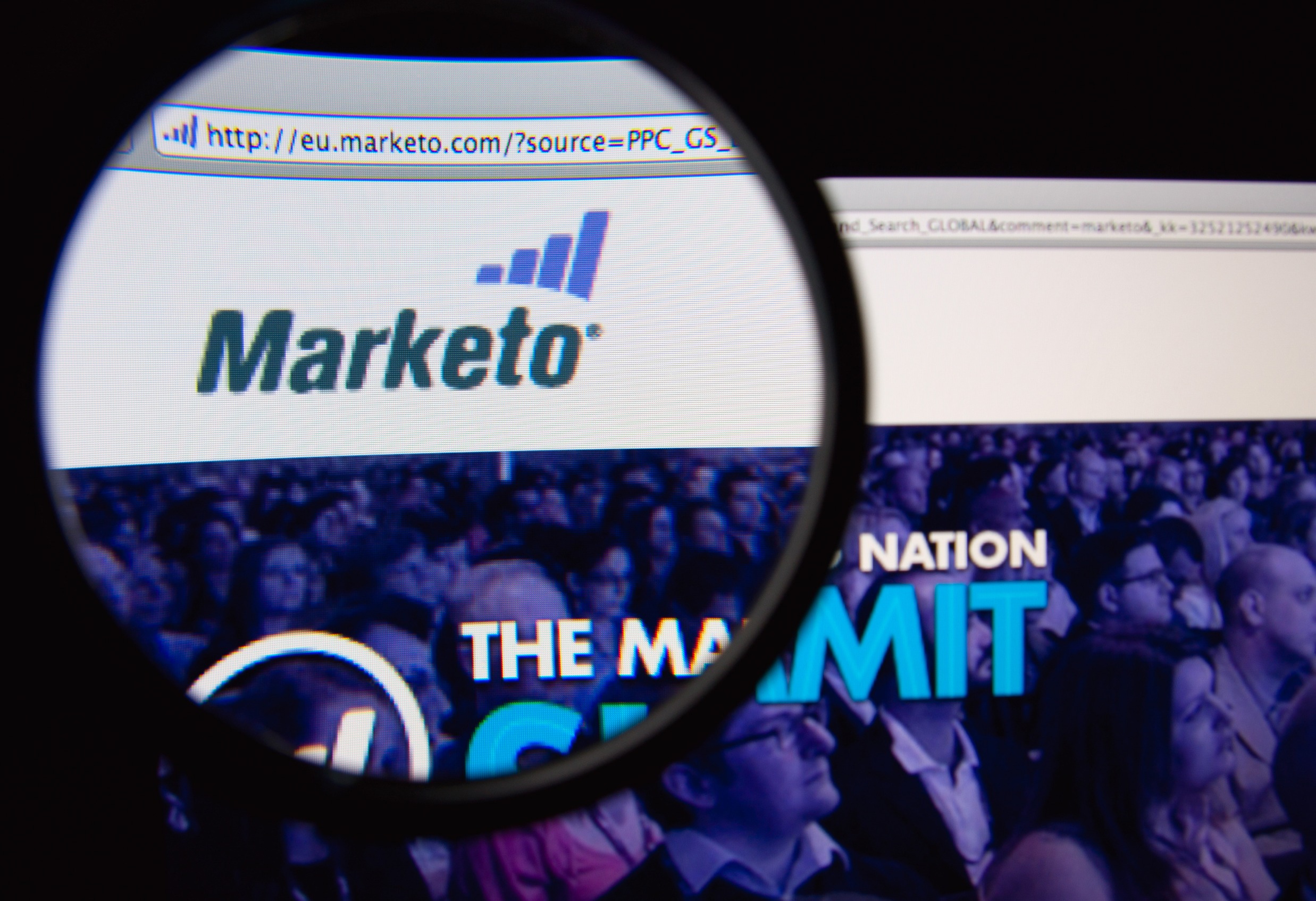Marketo website under a magnifying glass