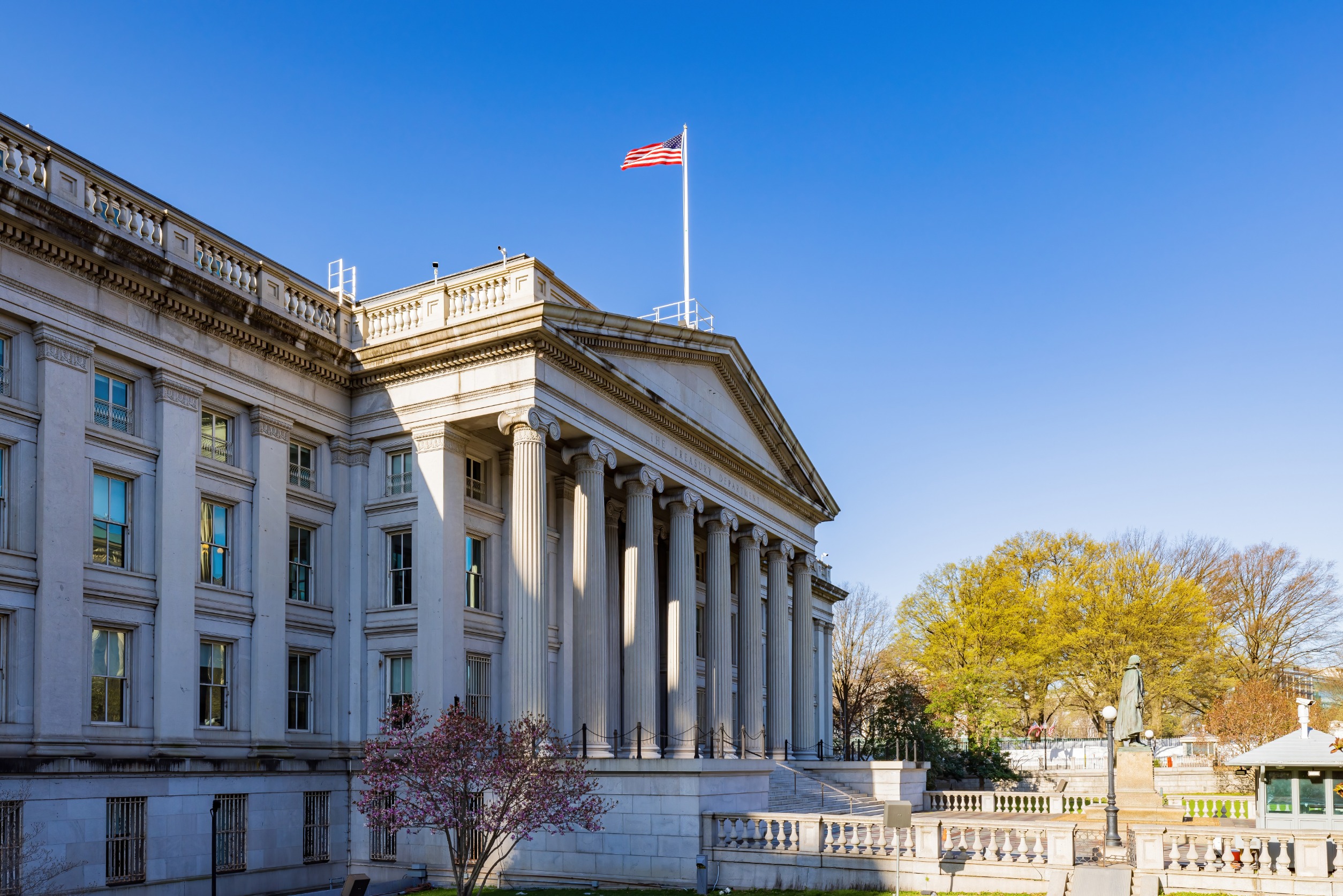 Side view of the US Treasury building on a sunny day