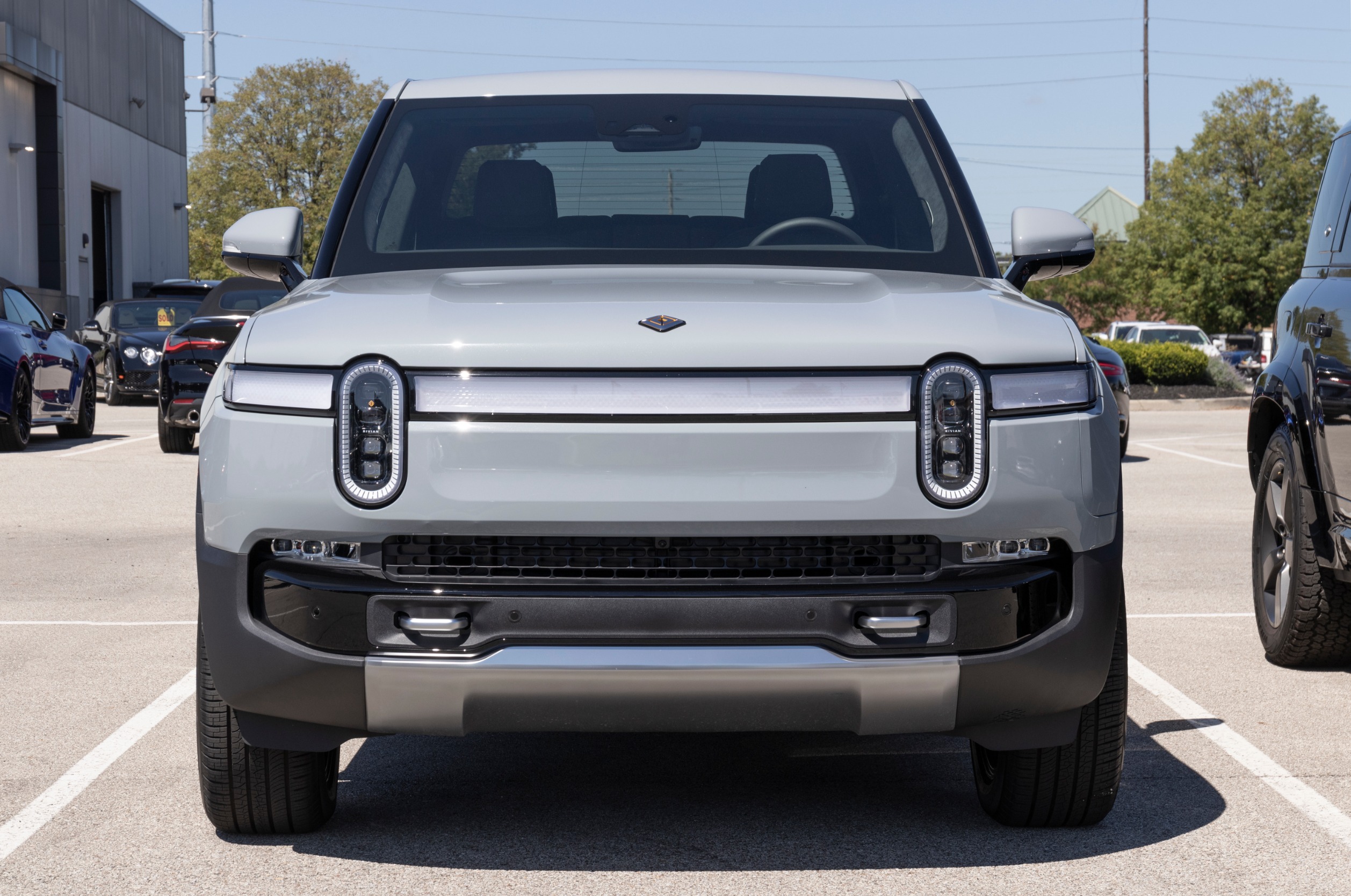 Rivian Vs. Tesla: Which EV Stock Offers More Opportunity for Growth ...