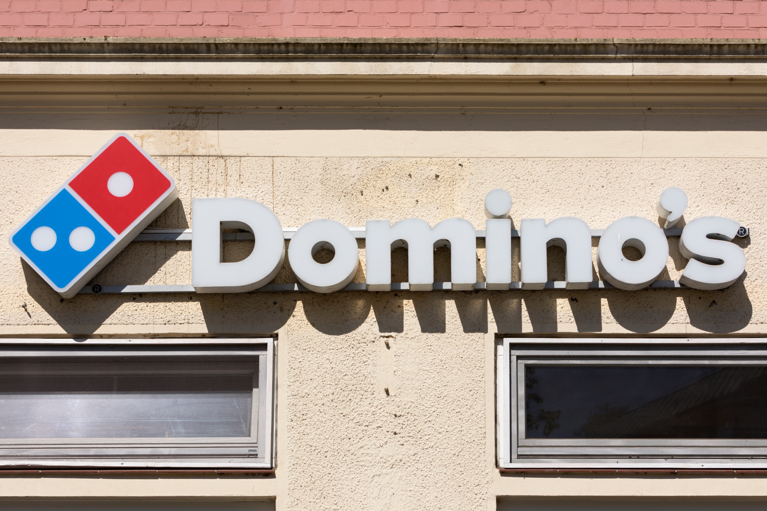 Domino's Earnings Beat Overshadowed by Sluggish Growth and Stock Dive