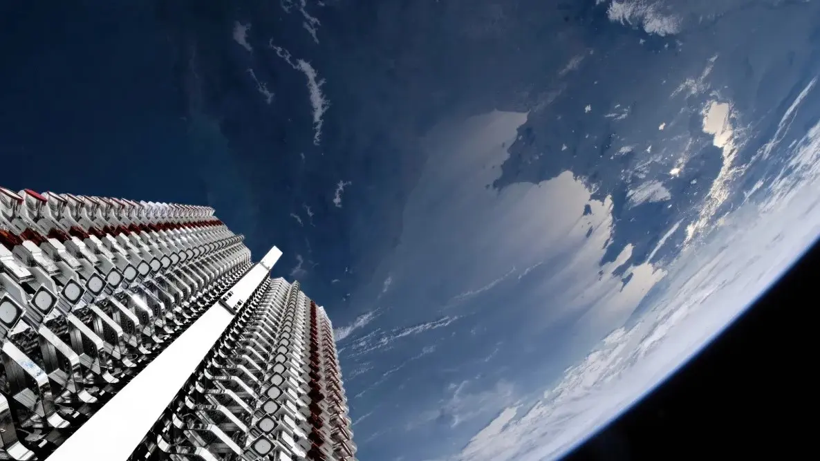 A view of Starlink satellites orbiting Earth, with Earth visible in the background.